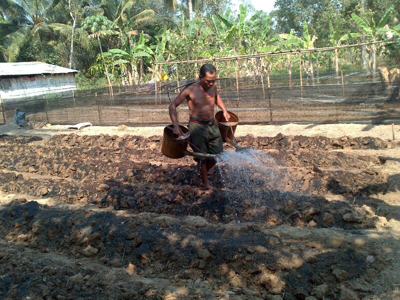 RM watering with two watering cans