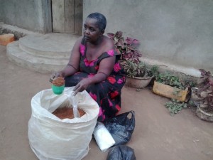 Mama GMA preparing tea leaves for her small business.