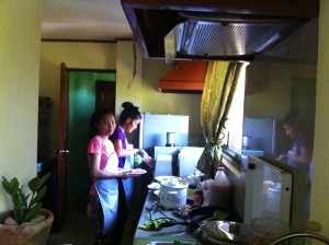 EB helping in Buleng's Fusion Cafe's kitchen