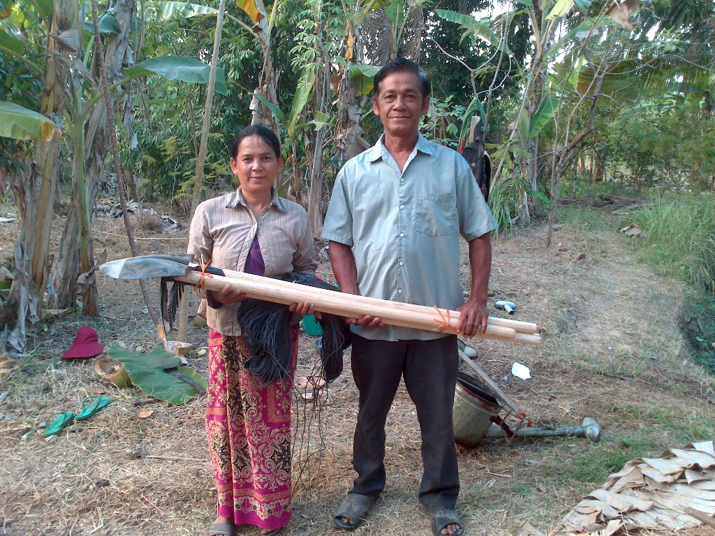 Y family receiving garden tool kit - 25 Jan 2013