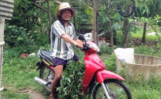 GP on his scooter with vegetables 2