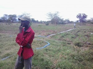 Water lines running out to irrigate the GAM family tomato field.