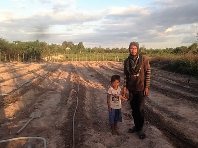 LC and his son getting ready to plant their expanded organic vegetable garden