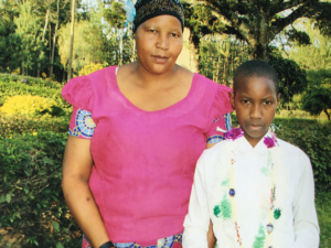 Mrs AJN and her son, Aidani, after celebrating his first communion.