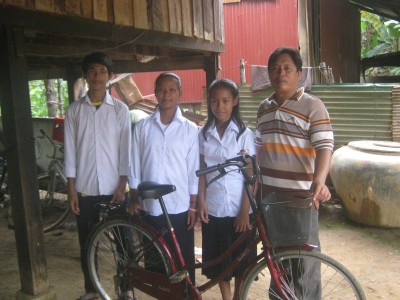 Lei family with bicycle